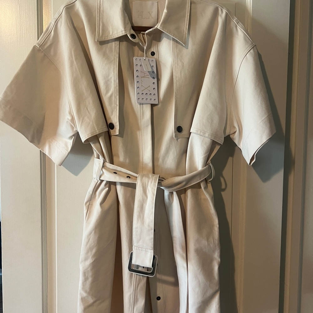 Beautiful cream wrap trench jacket. Never worn